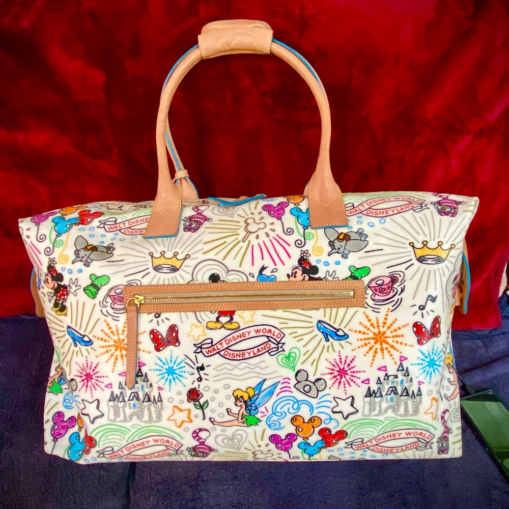 The Biggest and Best Dooney Disney Parks Sketch Weekender Bag